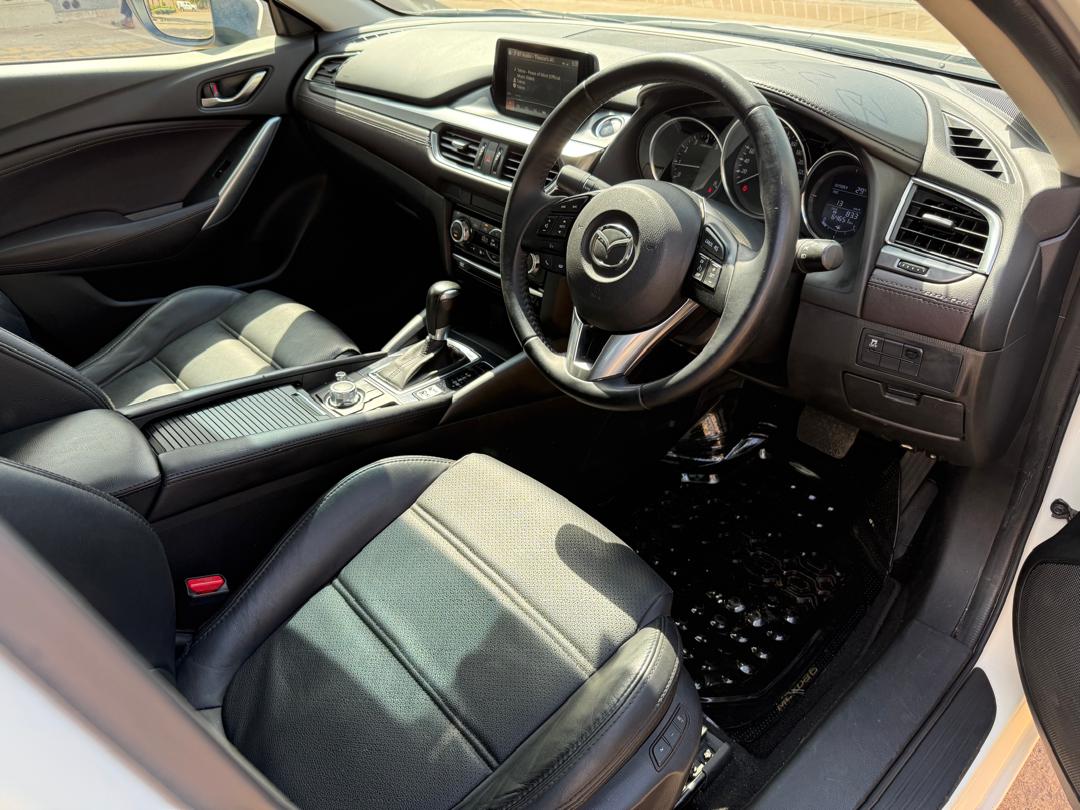 Unregistered Mazda Axella