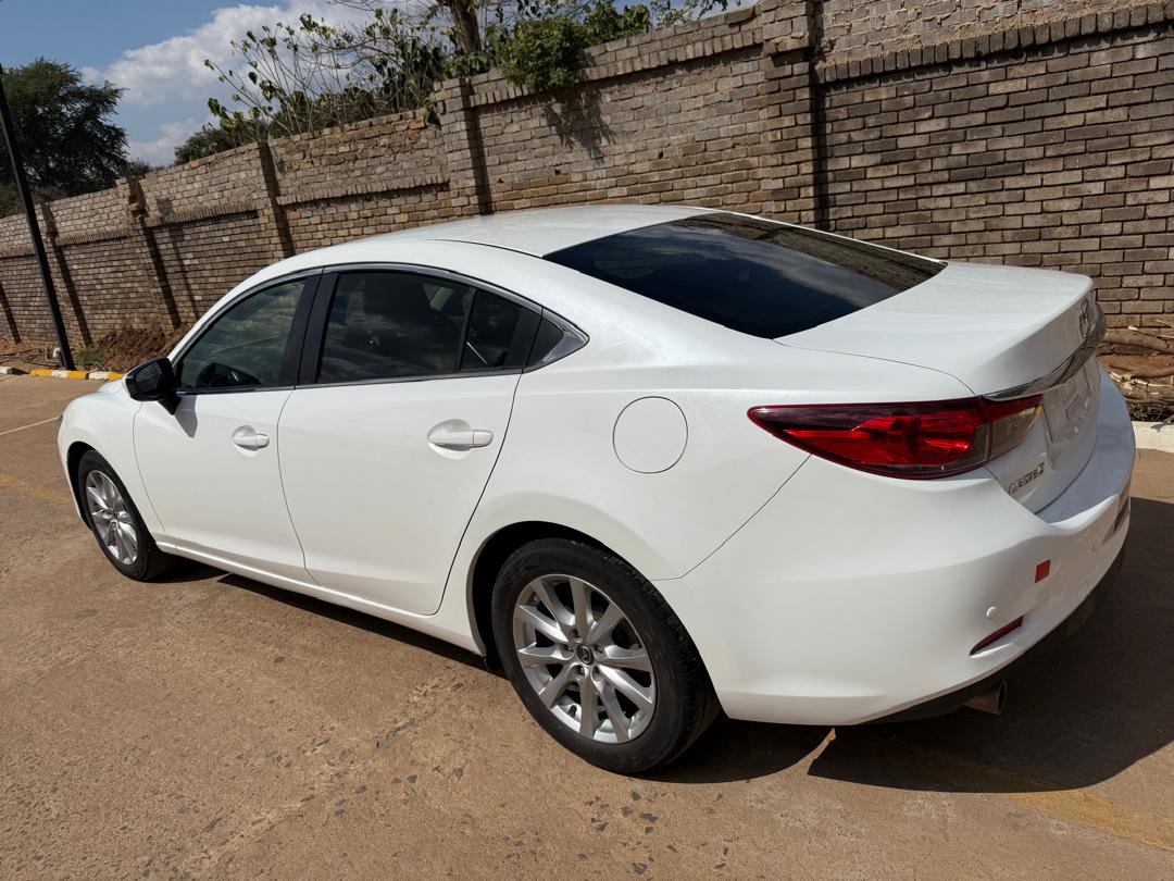 Unregistered Mazda Axella