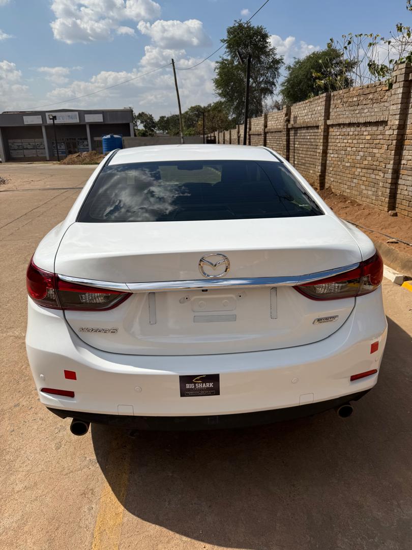 Unregistered Mazda Axella