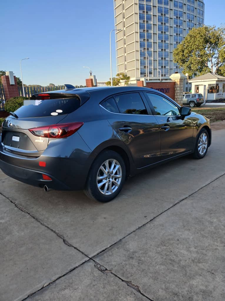 Unregistered Mazda Axella