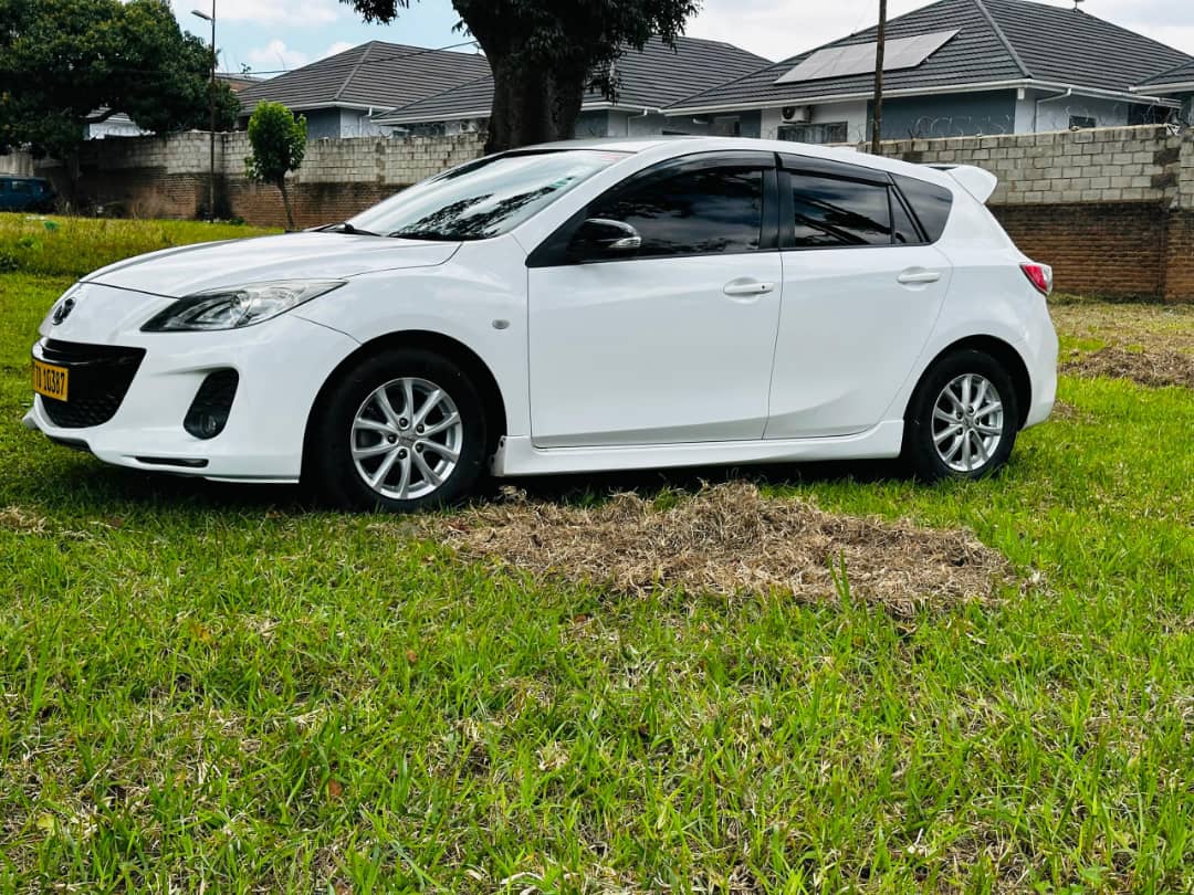 Registered Mazda Axella Hatchback